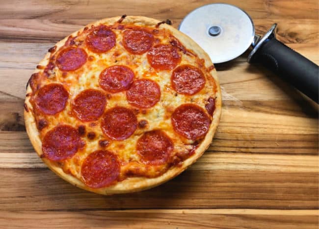 My family is a big fan of Pizza Hut's pan pizza- with its thick crispy crust and yummy toppings! But sadly there are no Pizza Hut restaurants anywhere near where we live- so after trying out many different versions of copycat recipes- we've perfected this one! You'll definitely want to try our Copycat Pizza Hut Pan Pizza Recipe!