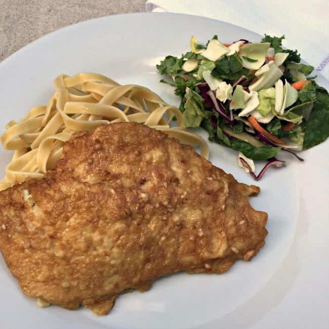 This is an easy weeknight recipe that takes thinly sliced chicken breasts and pairs them with a light lemon sauce- perfect for serving along side a bed of pasta! Kids will love this recipe for easy weeknight chicken francaise!