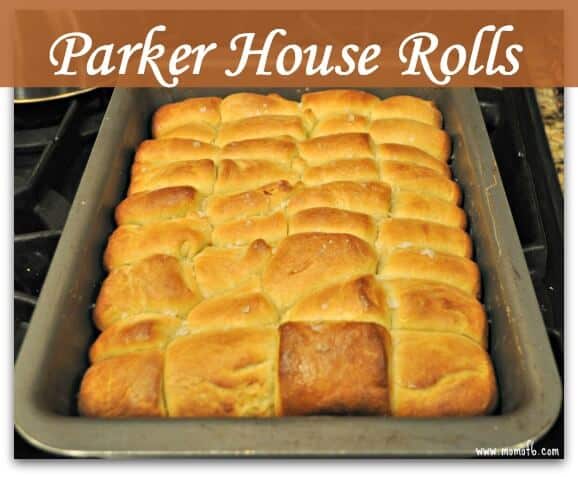 These Parker House rolls are simply decadent. According to Wikipedia, Parker House rolls were invented at the Parker House Hotel in Boston during the 1870's, most likely created by an angry cook throwing unfinished rolls into the oven which resulted in their dented appearance.