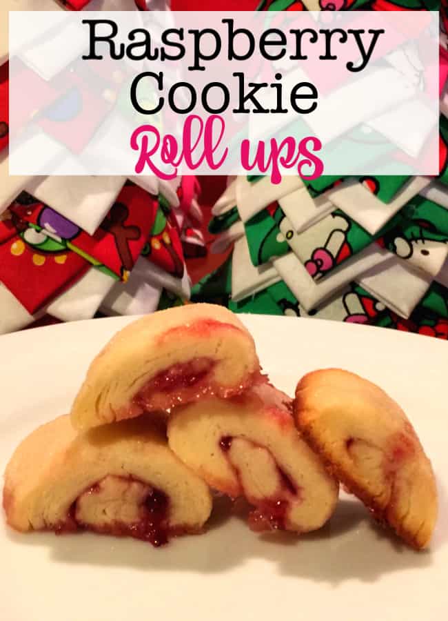 Baking with the kids is a great thing to do -especially with a holiday treat that is sweet, sticky, and fun to make together- like these raspberry cookie roll ups!