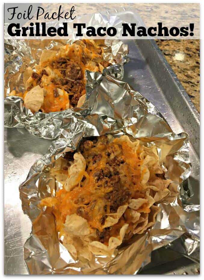 Foil Packet Grilled Taco Nachos made on the grill! Preparing them in a foil packet and then grilling them adds a delicious smoky flavor to the nachos! You gotta give it a try!