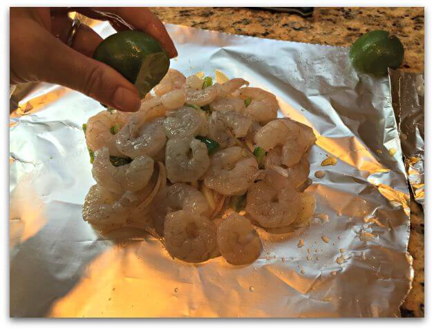 This recipe for Foil Packet Grilled Shrimp Fajitas is super simple to prepare- the kids can literally do it themselves- and has become one of our family's favorites!