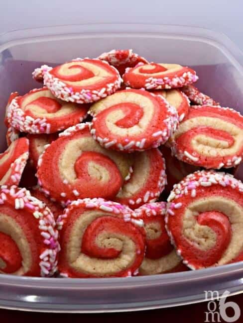 I've made pinwheel cookies before, but this time I thought it would be fun to try a swirl cookie with three shades of pink! So the kids and I created these sweet pink ombre swirl cookies!